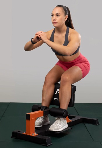 sissy squat machine oefeningen